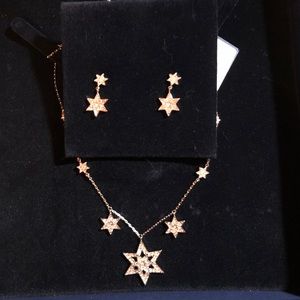 Swarovski star necklace and earring set; brand new